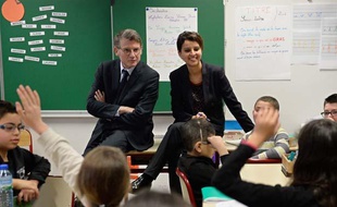 Vincent Peillon et Najat-Vallaud Belkacem, le 13 janvier 2014 à Villeurbanne, lors d'un déplacement sur les modules «ABCD de l'égalité».