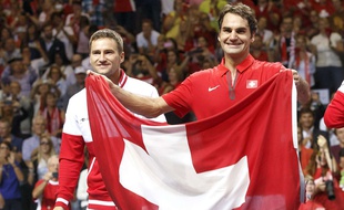 Marco Chiudinelli et Roger Federer, le 14 septembre 2014 à Genève.
