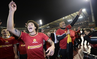 Les Belges célèbrent leur victoire contre Israël, le 13 octobre 2015, à Bruxelles.