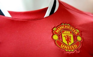 L'action du club de football anglais Manchester United a légèrement reculé mercredi à Wall Street, fragilisée par l'annonce du départ à la retraite à la fin de la saison de son entraîneur mythique, l'Ecossais Alex Ferguson.