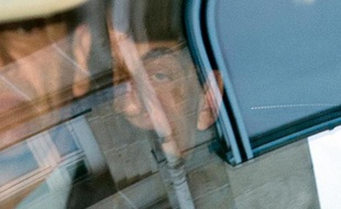 Le président de l'uMP et ex-président de la République Nicolas Sarkozy arrive au Pôle financier du TGI de Paris, le 1er avril 2015