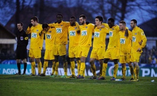 La ville d'Epinal, 32.000 habitants, semblait étonnée elle-même dimanche que son club de football, avant-dernier du National, ait éliminé Lyon, le tenant du titre, de la Coupe de France, une victoire à laquelle le maire confiait n'avoir jamais songé, "même pas en rêve".