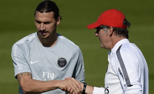 Zlatan Ibrahimovic et Laurent Blanc lors d'un entraînement du PSG au Camp des Loges, le 12 septembre 2014.