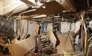 L'immeuble de la radio-télévision d'état après l'attentat de ce lundi 6 août 2012, à Damas en Syrie.