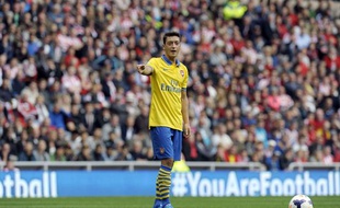 L'attaquant d'Arsenal Mesut Özil lors d'un match contre Sunderland, le 14 septembre 2013.