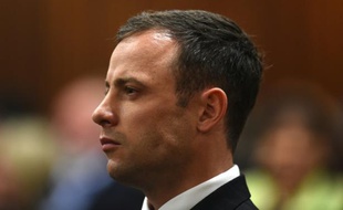L'ancien champion paralympique sud-africain Oscar Pistorius lors de son procès pour le meurtre de sa compagne, le 11 septembre 2014 à Pretoria