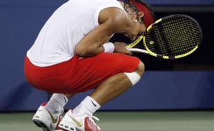 Rafael Nadal of Spain celebrates match point against Mardy Fish of the U.S. during their match at the U.S. Open tennis tournament at Flushing Meadows in New York September 4, 2008. REUTERS/Shaun Best (UNITED STATES)
