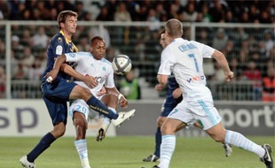 L'Olympien André Ayew (maillot blanc à gauche) a inscrit son premier doublé.