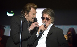 Johnny et Hallyday et Jacuqes Dutronc pendant le concert des «vieilles canailles»