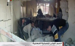 Des images de la télévision publique syrienne après le double attentat suicide visant des installations du service de sécurité le 23 décembre 2011.