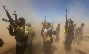 Les forces gouvernementales irakiennes sur le point d'entrer dans Tikrit le 11 mars 2015