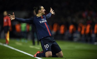 La star suédoise du PSG Zlatan Ibrahimovic exulte après un but face à Chelsea en Ligue des champions au Parc des Princes, le 13 mai 2016