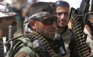 Des miliciens chiites irakiens le 19 mars 2015 à Nukhayb dans la province Anbar