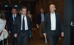 Nicolas Sarkozy et Alain Juppé, le 2 juillet à la Mutualité à Paris.