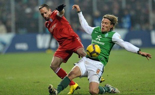 L'attaquant français du Bayern Munich, Franck Ribéry (en rouge) lors d'un match de Bundesliga contre le Werder Brême, le 22 janvier 2010.