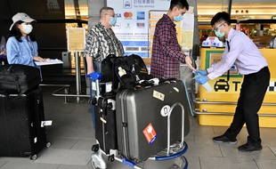 Contrôle des arrivées à l'aéroport de Taoyuan à Taiwan.