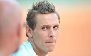 Le Français Nicolas Devilder en discussion avec son entraîneur, le 31 mai 2012, à Roland-Garros.