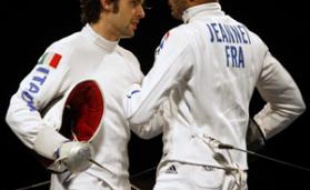 Fabrice Jeannet of France (R) and Matteo Tagliariol of Italy greet each other after their men's individual epee fencing final at the Beijing 2008 Olympic Games, August 10, 2008. REUTERS/Laszlo Balogh (CHINA)
