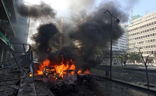 Attentat à la voiture piégée à Beyrouth, au Liban, le 27 décembre 2013.