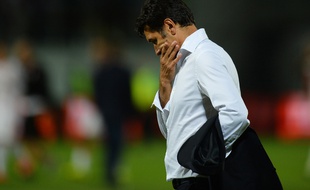 Hubert Fournier soucieux. AFP PHOTO / DANIEL MIHAILESCU