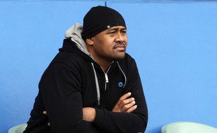 FILE - In this Oct. 19, 2011 file photo, All Blacks rugby legend Jonah Lomu watches Australia rugby players train in Auckland, New Zealand. New Zealand Rugby Union says Wednesday, Nov. 18, 2015 All Blacks great Jonah Lomu has died. He was 40. (AP Photo/Rob Griffith, File)/TOK102/813115713753/OCT. 19, 2011 FILE PHOTO/1511180148