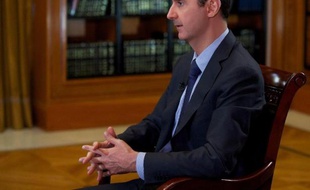 Photo transmise par l'agence de presse syrienne Sana montrant le président Bachar al-Assad lors d'une interview à Damas, le 21 octobre 2013