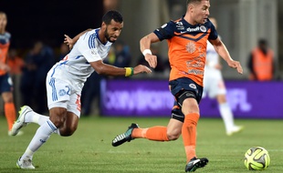 Le Marseillais Alaixys Romao et le Montpelliérain Anthony Mounier lors de Montpellier-Marseille, le 9 janvier 2015.