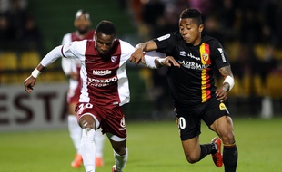 Nomenjanahary et Lens ont sombré en Lorraine. AFP PHOTO / JEAN-CHRISTOPHE VERHAEGEN