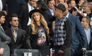 Beyoncé et Jay-Z au Parc des Princes lors de la victoire du PSG contre Barcelone en Ligue des champions le 30 septembre 2014.
