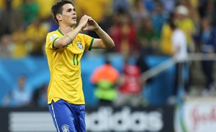 Oscar lors du match entre le Brésil et la Croatie le 12 juin 2014.