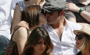 Jean Dujardin et Nathalie Péchalat à Roland-Garros le 7 juin 2015.