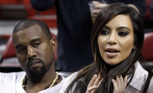 Kim Kardashian et Kanye West avant un match de basket à Miami, le 6 décembre 2012.