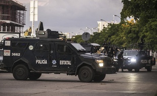 La police mexicaine à Culiacan, dans l'Etat du Sinaloa, le 17 octobre 2019, après un affrontement avec des hommes du clan de Joaquin