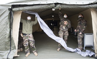 Le dimanche 22 mars 2020, le regiment medical de la Valhbonne met en place l'hopital de campagne a Mulhouse.