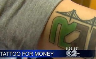 Un tatouage d'un employé de Rapid Realty.