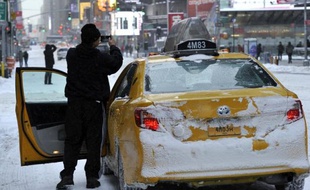 Un chauffeur de taxi à Times Square, à New York, le 3 janvier 2013
