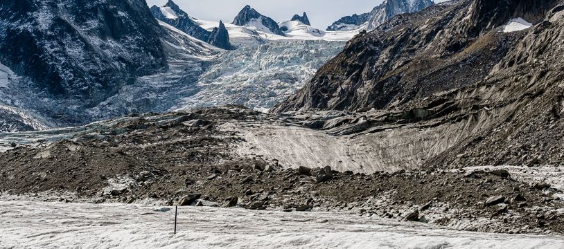 The Mer de Glace glacier, the largest glacier of the Mont Blanc massif in the French Alps is a witness of the global warming. In the foreground we can see the ablation stake to measure the melting of the glacier. This glacier shows on the surface many blocks in its median area, and in its most downstream part it is completely covered with blocks of rocks. Following the hot summer of 2022 and the drought, the first measurements made by the laboratory of glaciology of Grenoble show an unprecedented melting of Mer de Glace glacier since October 07, 2021, the glacier has already melted 8.50 meters between 2100m and 2400 m and it is not finished there are still 3 weeks of potential melting. These measurements are impressive and largely exceed all the measurements made on this glacier since 1969. The Mer de Glace is an alpine valley glacier located on the northern slope of the Mont-Blanc massif, in the French department of Haute-Savoie. France, Alps, Chamonix, September 23, 2022.//KONRADK_konrad-032/2209261101/Credit:KONRAD K./SIPA/2209261112
