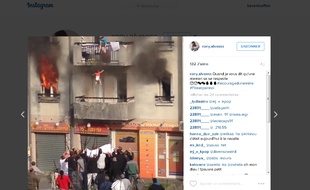 Capture d'écran d'une vidéo publiée sur Instagram montrant un bébé sauvé des flammes par un groupe de jeune de Corbeil-Essonnes, le 8 novembre 2015.