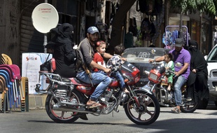 Une famille dans le centre d'Idleb, le 10 septembre 2018.