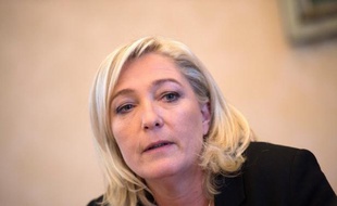 President of French far-right party Front national (FN), Marine Le Pen holds a press conference around the theme of "Le Rassemblement Bleu Marine" an association aiming to open the FN to allies who would not otherwise adhere to the party at the French National Assembly, on December 4, 2012 in Paris. AFP PHOTO MARTIN BUREAU