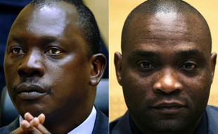 Les chefs miliciens congolais Thomas Lubanga (G) et Germain Katanga lors de leur procès à La Haye le 23 mai 2014