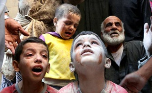 Au total, 240 millions d'enfants vivent dans des pays en guerre, comme ici en Syrie.