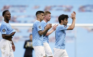 Une partie de l’équipe de Manchester City à la fin d'un match de Premier League à domicile contre Norwich, le 26 juillet 2020.