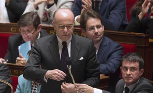 Le ministre de l'Intérieur Bernard Cazeneuve et le Premier ministre Manuel Valls le 18 novembre 2014 à l'Assemblée nationale à Paris