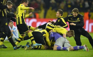 Dortmund, grâce à deux buts de Reus et Santana dans le temps additionnel, a arraché son billet pour le carré final de la Ligue des champions en battant 3-2 Malaga en quart retour (0-0 à l'aller), mardi à l'Iduna Park.