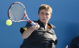 Le tennisman français Gilles Simon, lors de d'un match contre Richard Gasquet à Sydney, le 14 janvier 2009.