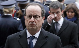 François Hollande et Manuel Valls, lors de l'hommage aux policiers tués, le 13 janvier 2015 à la préfecture de police de Paris