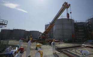L'opérateur de la centrale nucléaire japonaise Fukushima Daiichi s'activait mardi pour relancer les systèmes de refroidissement des piscines de stockage du combustible, arrêtés depuis une panne de courant la veille au soir.