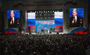 Vladimir Poutine assiste à un concert le 14 mars 2018 à Sébastopol, en Crimée.