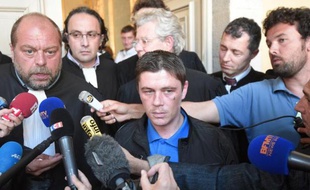 Daniel Legrand (D) et son avocat Eric Dupond-Moretti au palais de justice lors de son procès le 4 juin 2015 à Rennes